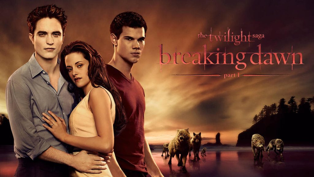 Movie title card for The Twilight Saga: Breaking Dawn Part 1, featuring a romantic and ethereal image of Edward and Bella embracing during their wedding.