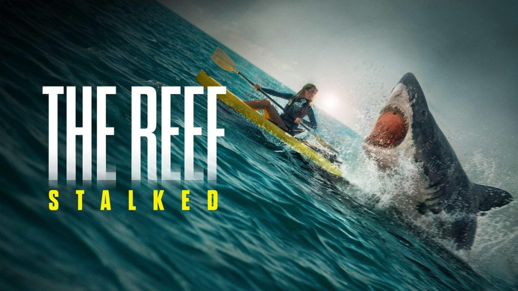 Movie poster for The Reef: Stalked, showing kayakers being stalked by a shark beneath the surface.