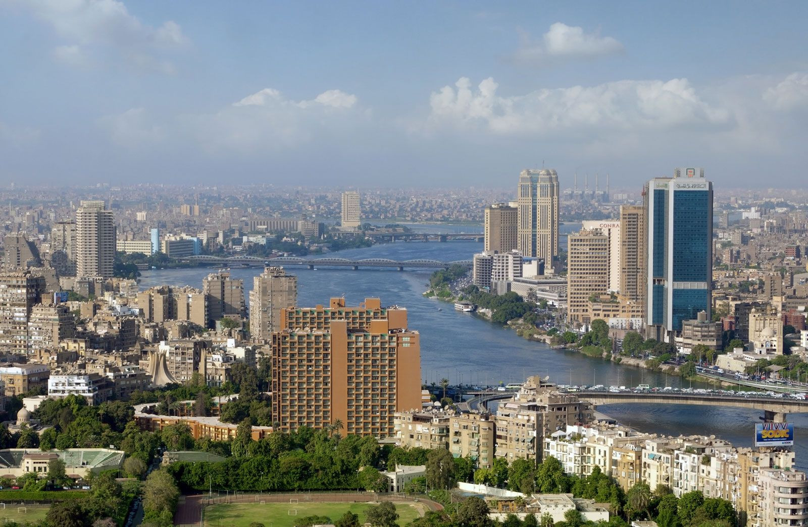 Aerial view of Cairo, Egypt, showcasing the sprawling urban landscape along the Nile River
