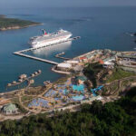 Aerial view of Amber Cove cruise port and surrounding turquoise waters