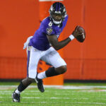 Lamar Jackson in action for the Baltimore Ravens. Discover where Lamar Jackson went to college and how his time at the University of Louisville shaped his football career.