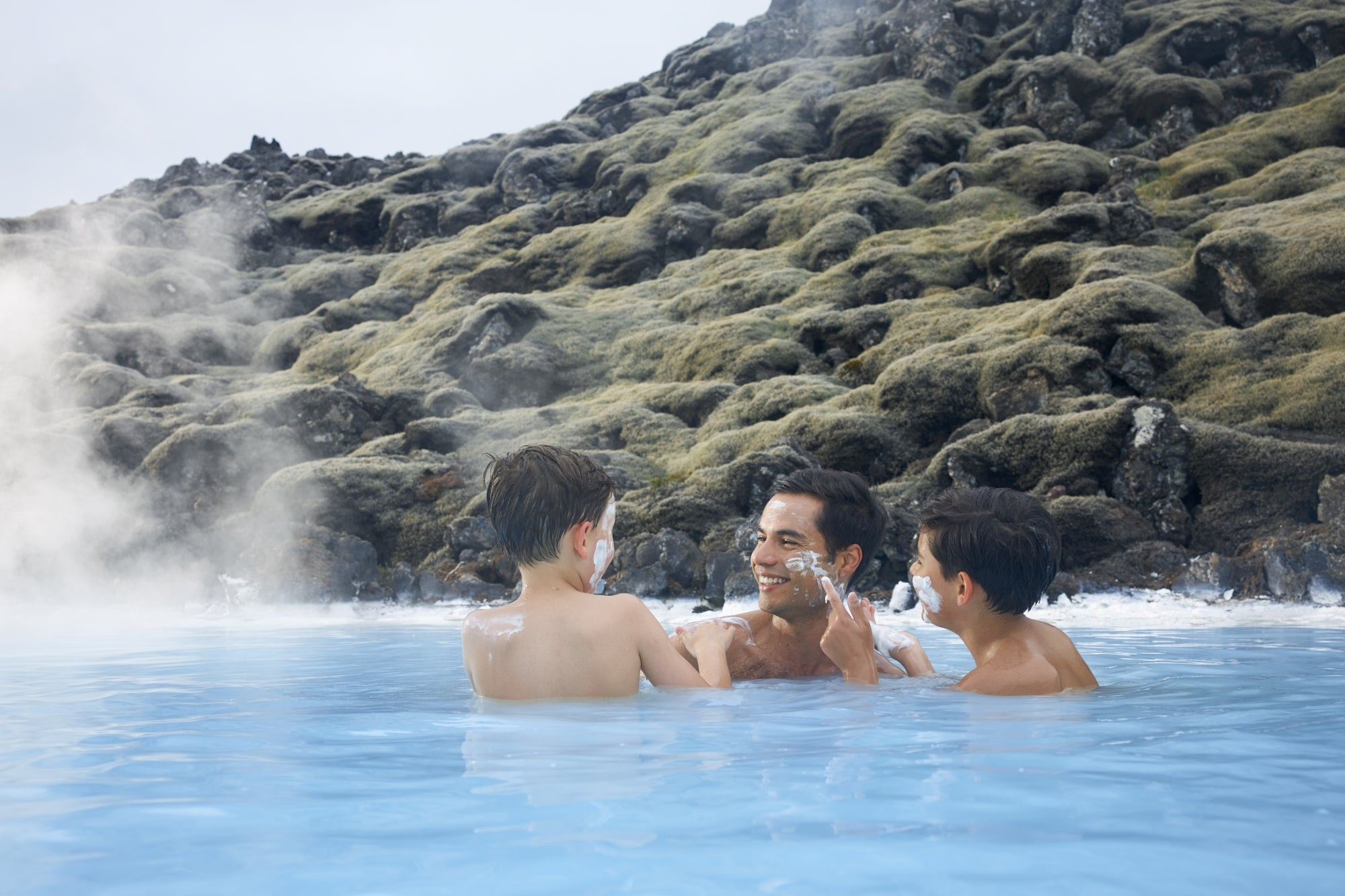 Applying a silica mud mask at the Blue Lagoon spa in Iceland