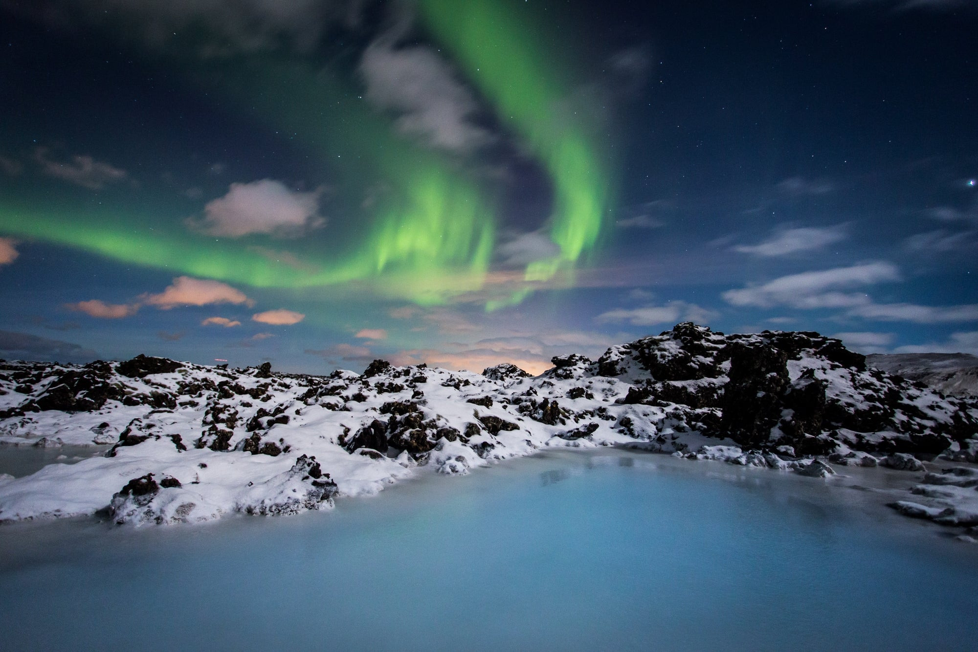 Blue Lagoon in winter with the Northern Lights in Iceland