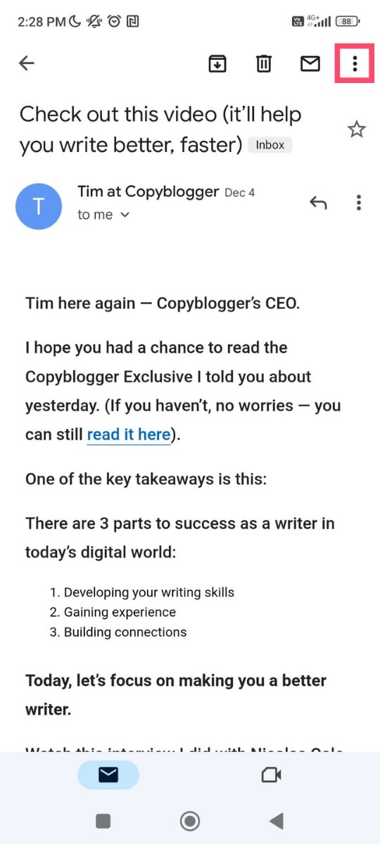 Accessing the dropdown menu within an archived email in the Gmail app on Android.