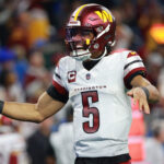 Jalen Hurts leading the Philadelphia Eagles offense in a playoff game