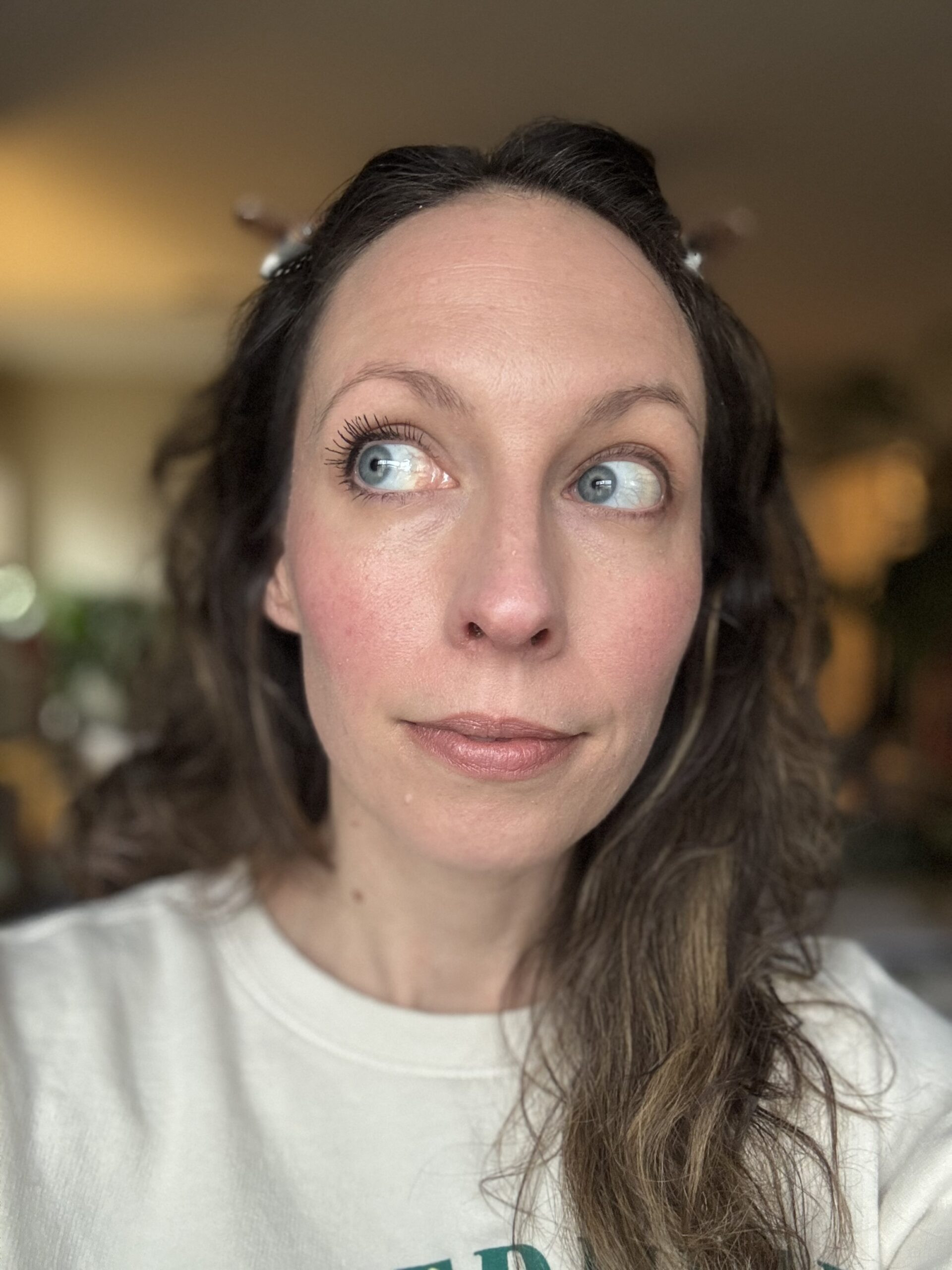 Model wearing The Mascara with dramatic lashes