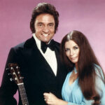 Johnny Cash and June Carter Cash, a legendary couple in country music, showcasing their love and musical partnership.