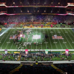Aerial view of football field (Fans eagerly await the Super Bowl kickoff)