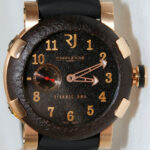 Close-up of the Romain Jerome Titanic DNA watch dial showing textured surface and anchor-shaped hands