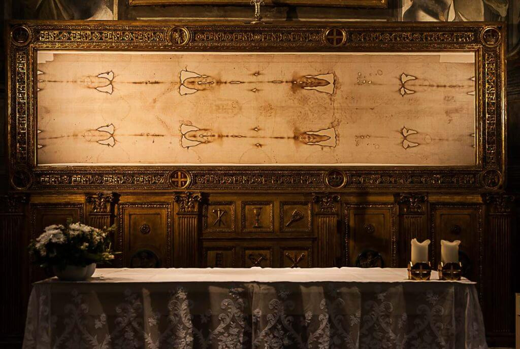 Close-up detail of a replica of the Holy Shroud of Turin, exhibited in Italy.