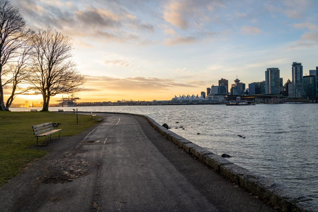 The Stanley Park Seawall in Vancouver, showcasing the scenic path along the water's edge, perfect for biking, walking, and enjoying panoramic views.