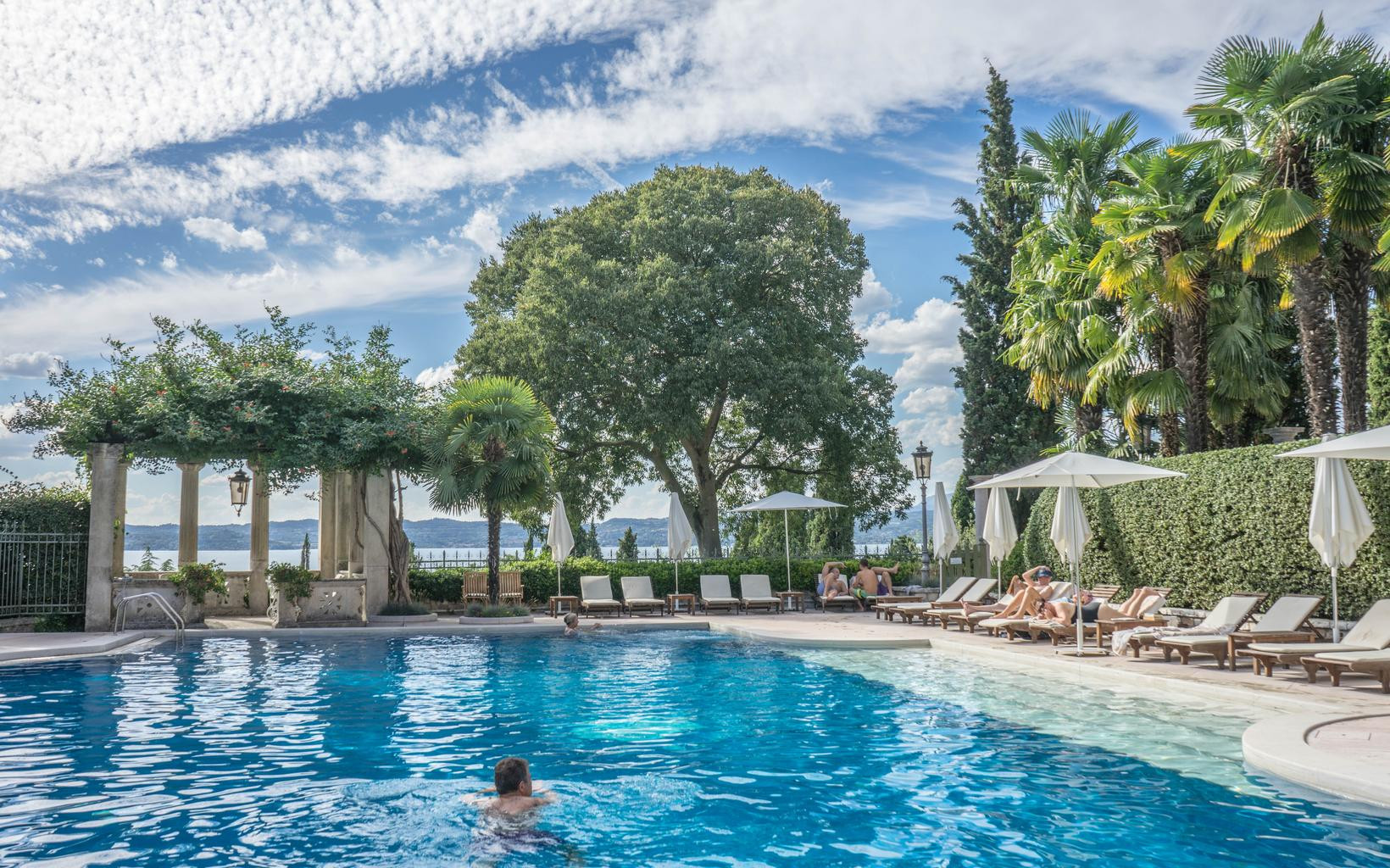 Luxurious villa with a pool, similar to those used in Love Island, available for vacation rentals.