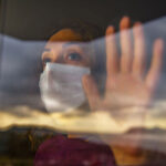 Woman Covering Her Face