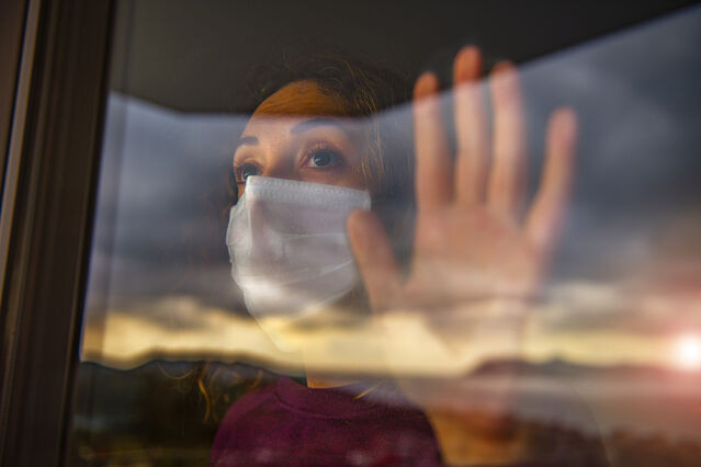 Woman Covering Her Face