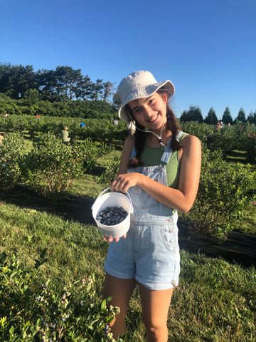 Girl holding bucket