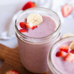 Beauty shot of strawberry smoothie jar.
